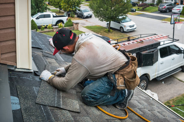 Professional Roofing technician working in Alexis, IL